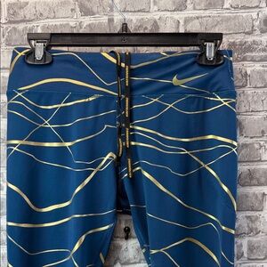 Nike running leggings with Blue and Gold Design‎